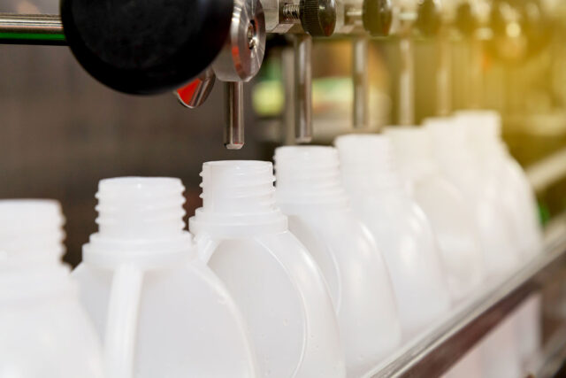 Bottles Filled On Production Line For Toll Packaging | Marco Chemicals